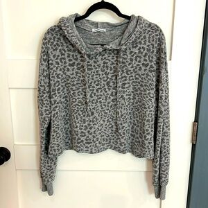 Cheetah print sweater with a hoodie